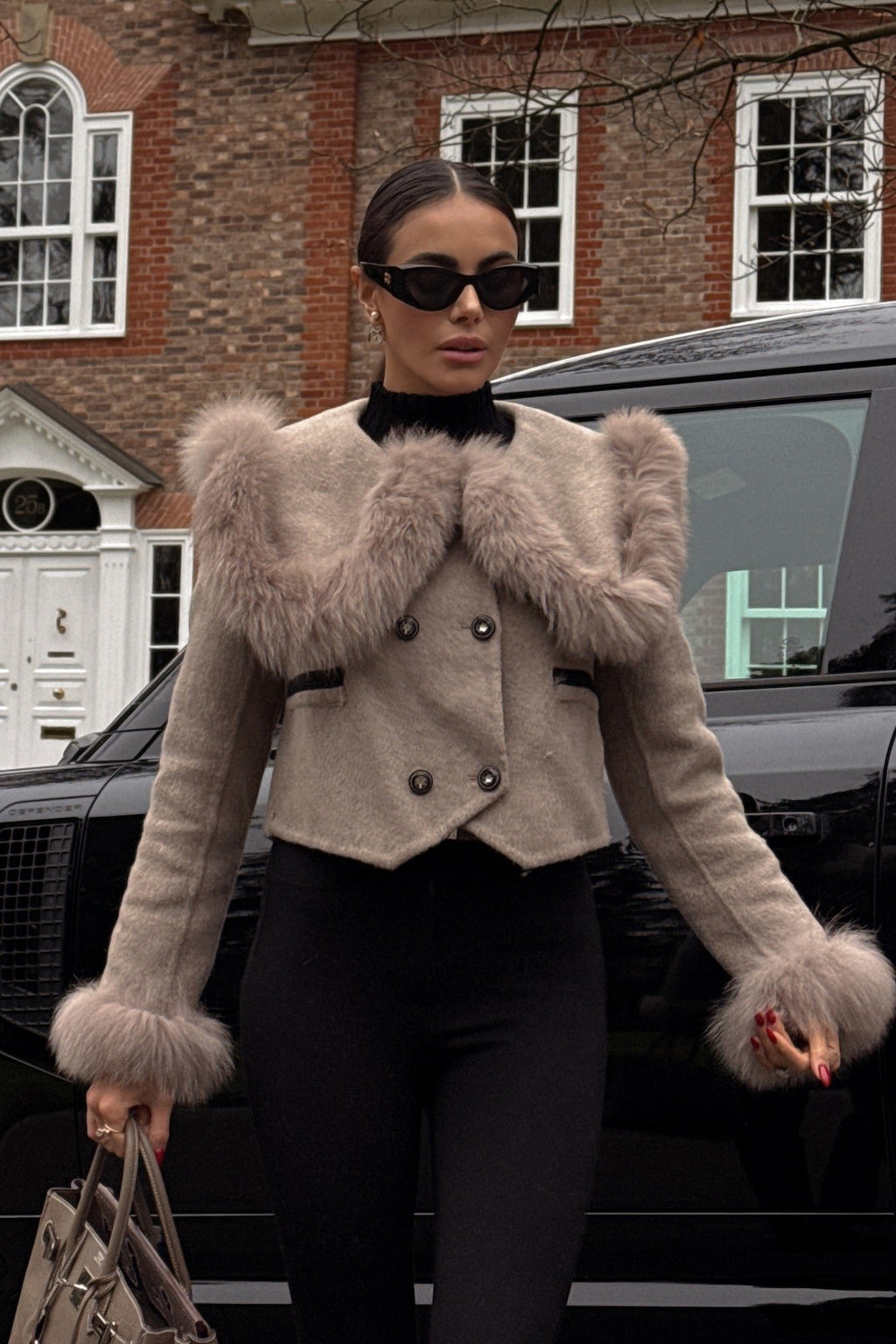 Dámská krátká bunda s límcem