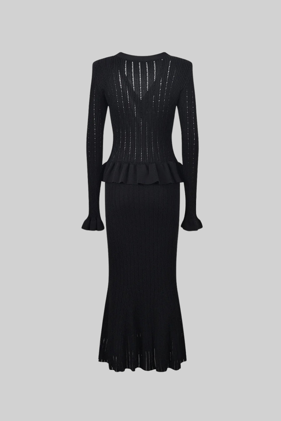 Dámský růžový kabát s černou sukní