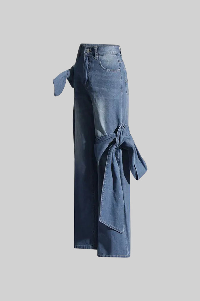 Dámské modré džínsy s mašlí